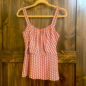 LIKE NEW CAbi sleeveless peplum tailored M top. Elastic @ side.Fitted & feminine